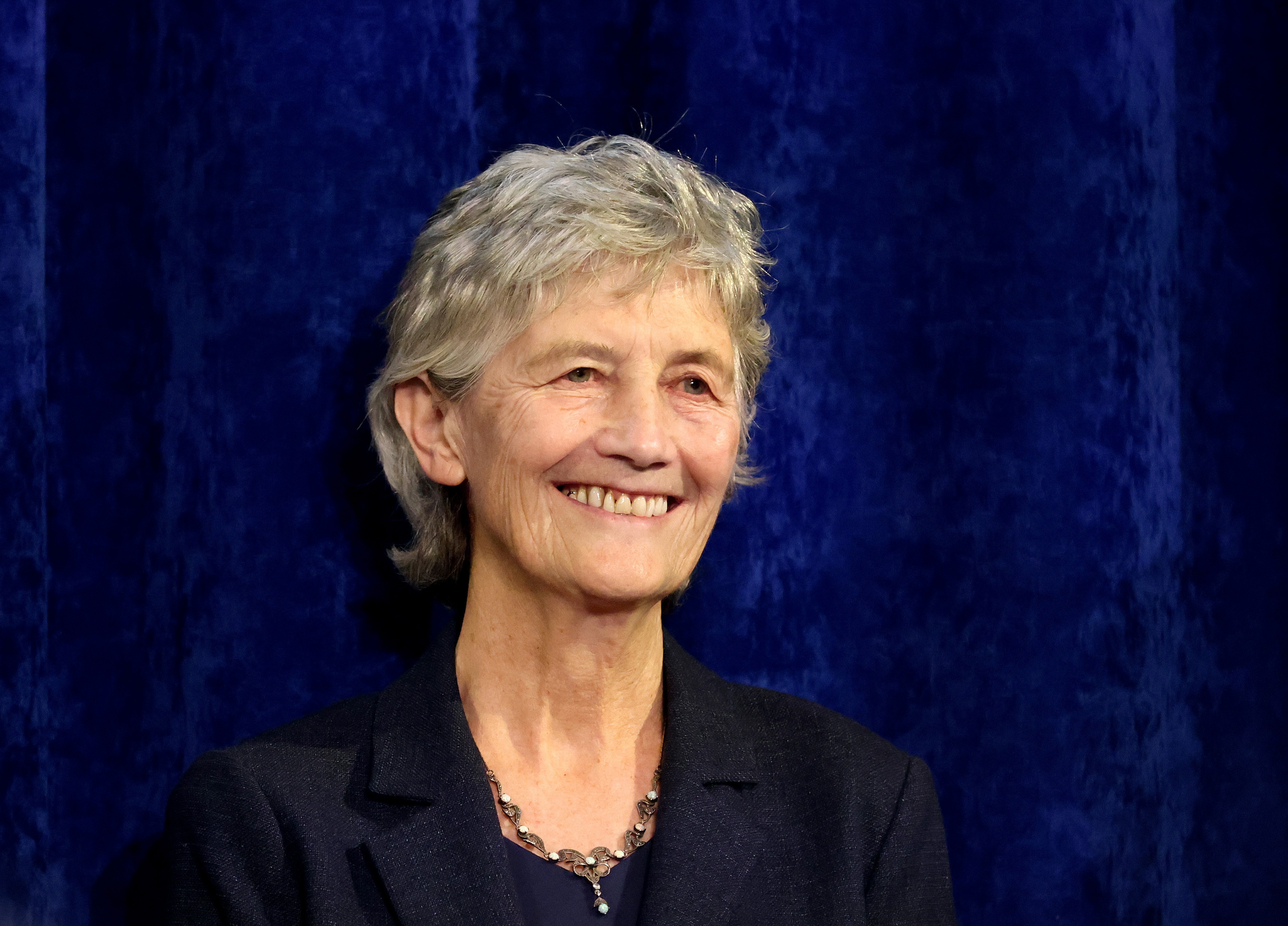 Catherine Connolly smiles to supporters after being elected as the new president of Ireland at Dublin Castle on Saturday.
